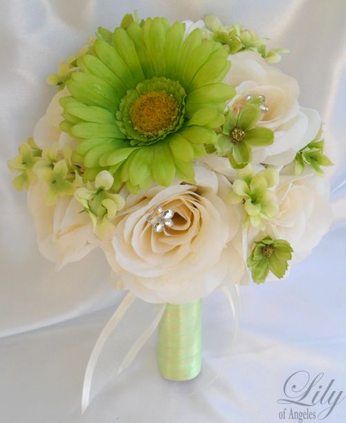 all boutonnieres above are made with one ivory rosebud accented with 