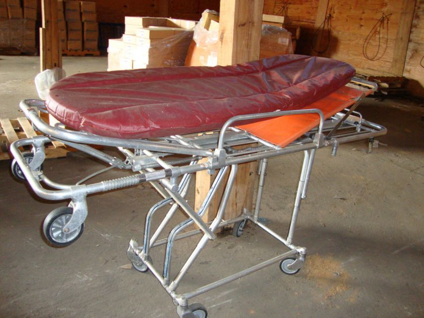 Adjustable Ambulance Gurney. Ground Level to Full Upright and Tilting 