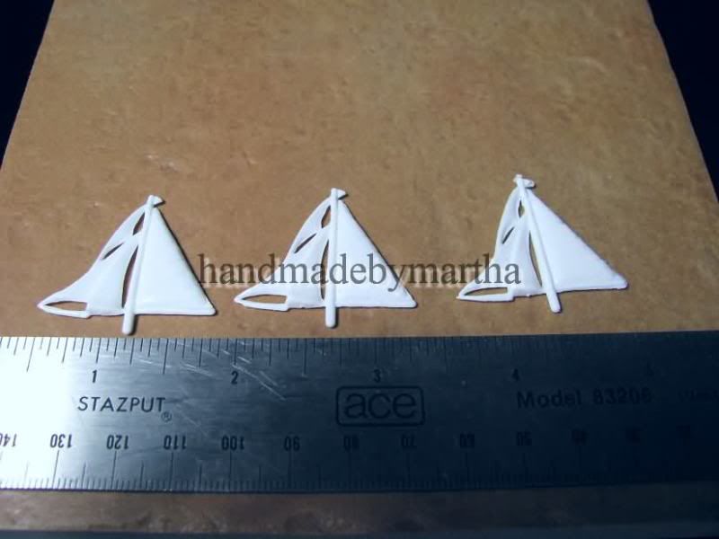 Up for auction are 3 white cutter sails from American Heritage Game 