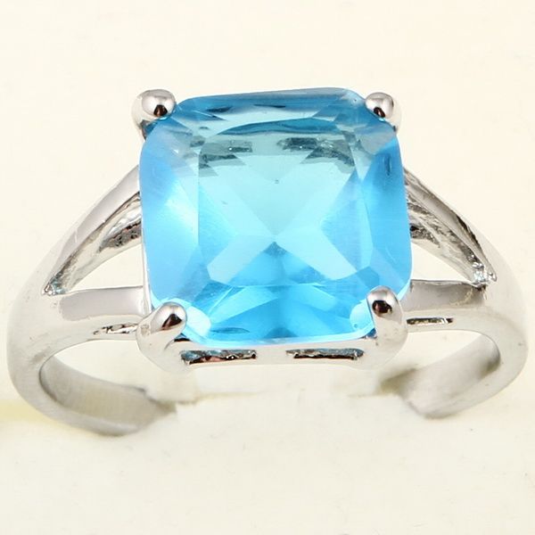 LARGE RADIANT CUT BLUE TOPAZ A075 RING  