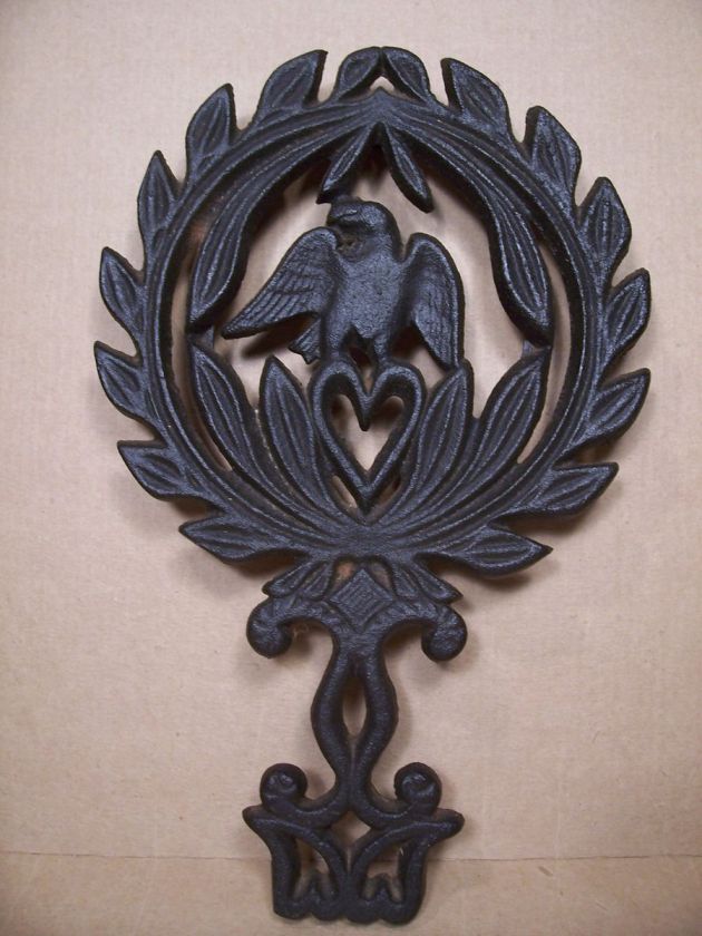 Vintage Cast Iron Trivet / Hot Plate  Eagle, Wreath of Leaves & Heart 